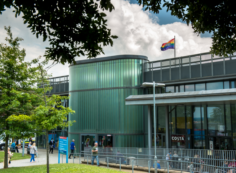 The main entrance of Rotherham Hospital on a cloudy day