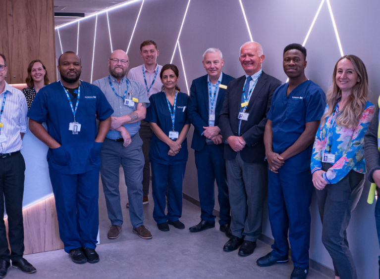 Trust staff inside the reception area of the CT scanning suite based at BreathingSpace