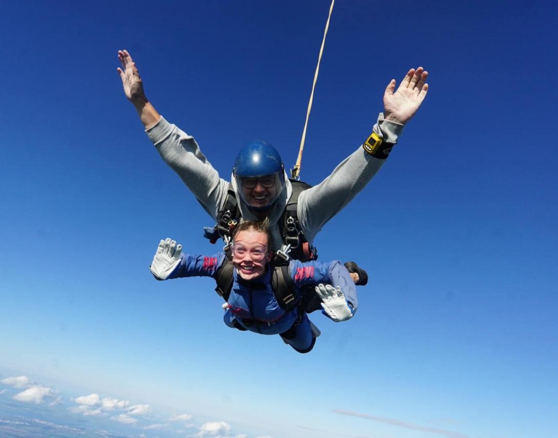 A woman skydiving 